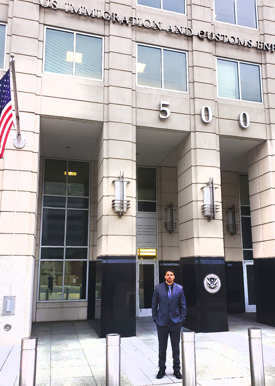 Kario Gonzalez in front of U.S. Immigration and Customs Enforcement building