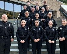 The 2021 Recruit Class of Appalachian State University’s Police Officer Development Program gathers outside Rosen Concert Hall before the Sept. 11 graduation ceremony. Pictured, from left to right, are (front row) Captain K.C. Mitchell, Haley Bain, Emylee Rhodes, Hailey Dehn and Master Police Officer Bettina Dunn; (second row) Holly Swofford, Kira Green and Chasey Baremor; (third row) Anthony Ross and Ryan Carroll; (fourth row) Brooks Tipton, Skye Clark and Michael Smuda; (fifth row) Garrett Jones, Erica Ba
