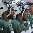 New York Jets' Doug Middleton (center) looks at the field during practice at the NFL football team's training camp in Florham Park, N.J.