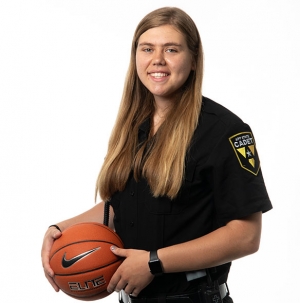 Bayley Plummer ’19, a recent graduate of Appalachian’s B.S. in criminal justice program who is continuing her Appalachian education by pursuing an MPA. She will continue to work part-time security shifts as an Appalachian police cadet while she earns her graduate degree and plays one more season as a center/forward for the Mountaineers women’s basketball team. Photo by Chase Reynolds